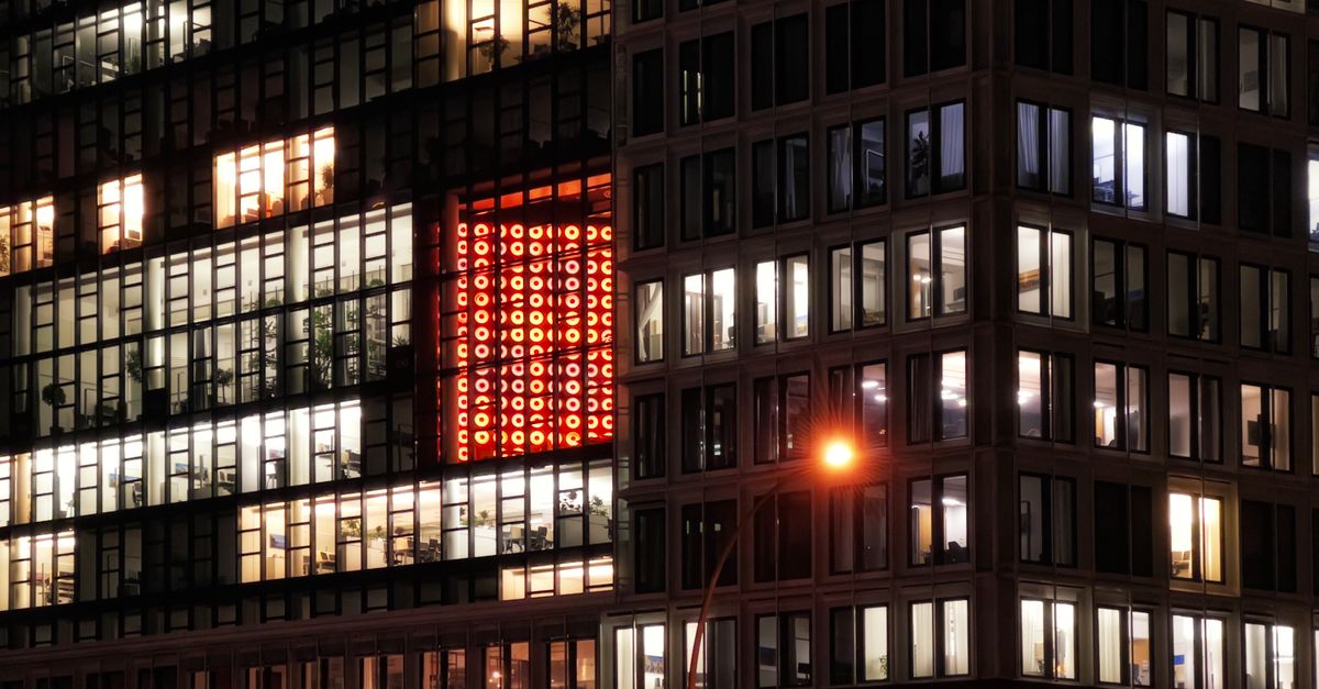City office building lit up at night