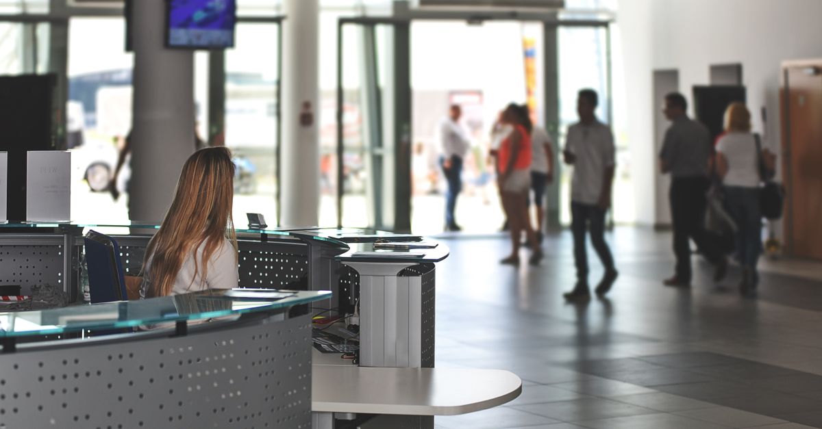 AI receptionist answering calls in a modern small-business office